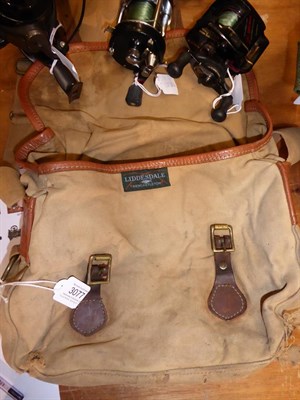 Lot 3077 - A Liddesdale Tackle Bag containing a collection of mixed reels to include a Abu Ambassadeur...