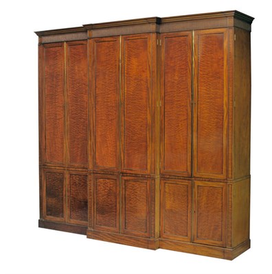 Lot 1360 - A Regency Mahogany and Ebony Strung Breakfront Wardrobe, 2nd quarter 19th century, the...