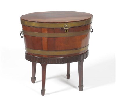 Lot 1371 - A George III Mahogany and Brass Bound Wine Cooler, late 18th century, the body of oval staved...