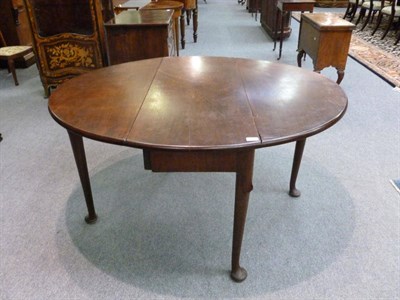 Lot 1380 - A George III Mahogany Dropleaf Dining Table, late 18th century, the rounded rectangular top...