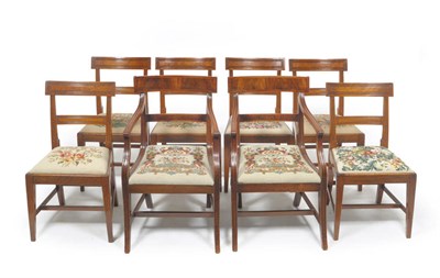 Lot 1385 - A Set of Six Regency Mahogany Dining Chairs, circa 1820, with reeded back supports and uprights...