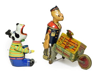 Lot 3447 - Louis Marx C/w Popeye Express with Popeye pushing a wheel barrow with crate with a parrot on...