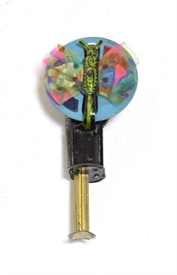 Lot 3449 - Novelty Butterfly Spinner  with butterfly with celluloid wings in front of rotating disc with flint