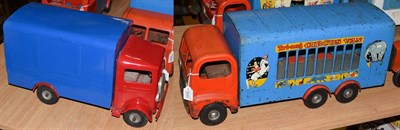 Lot 3450 - Triang Pressed Steel 6-Wheel Circus Van Truck (F-G) together with a Delivery van (repainted) (2)