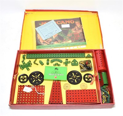 Lot 3476 - Meccano Outfit No.7 red/green parts strung on reproduction card inserts with Instruction for...