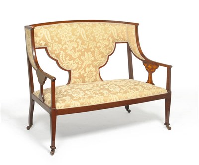 Lot 1404 - An Arts & Crafts Mahogany and Floral Marquetry Wing Back Settee, late 19th century, upholstered...