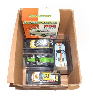 Lot 3659 - Scalextric Cars (i) Mini 50 Years 1959 (E box E) (ii) Mini Cooper Rally (iii) Ford GT40 (iv)...