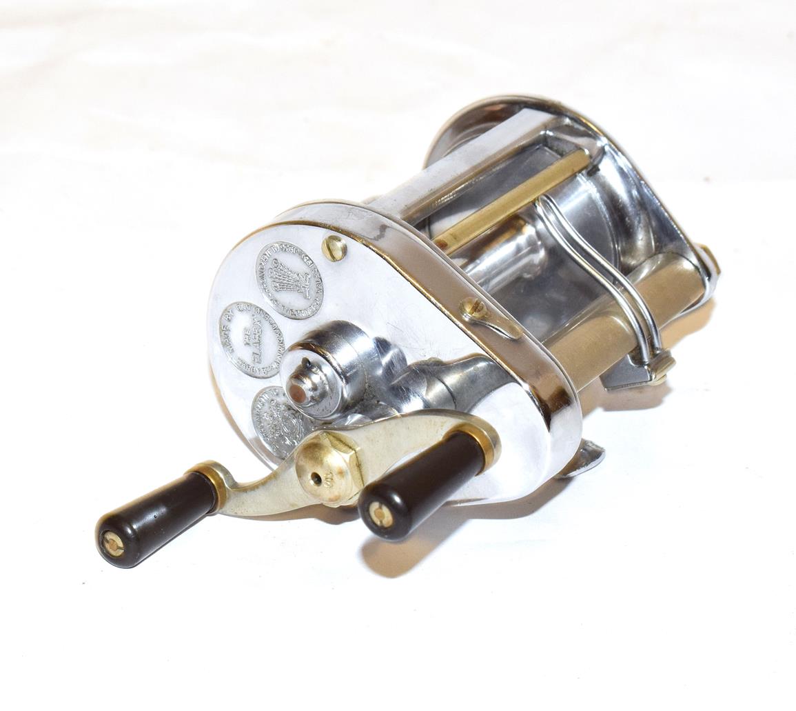Lot 3041 - A Hardy Elarex Multiplier Reel along with a Hardy ''Wanless'' 2 section cane spinning rod,7'...