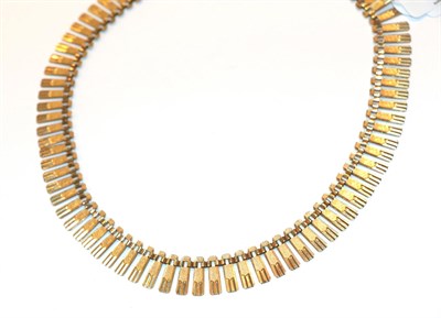 Lot 1 - A 9 carat gold textured fringe necklace, 40cm long