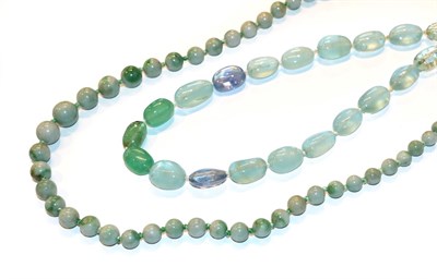 Lot 9 - A jadeite bead necklace, length 76cm, and a quartz and beryl bead necklace, length 43.5cm  (2)