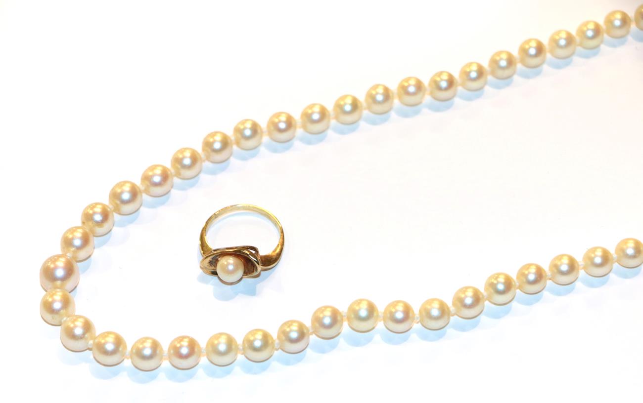Lot 15 - A single row cultured pearl necklace, length 50cm and a cultured pearl ring, indistinctly...