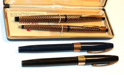 Lot 31 - Three Sheaffer fountain pens and a ballpoint pen