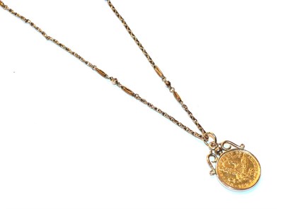Lot 36 - A USA ten dollar coin, dated 1893 mounted as a pendant, on a fancy link chain, stamped '9C'