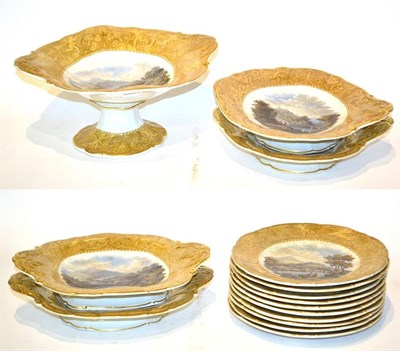 Lot 59 - A Pratt-type part dessert service, decorated with landscape scenes within yellow and gilt...
