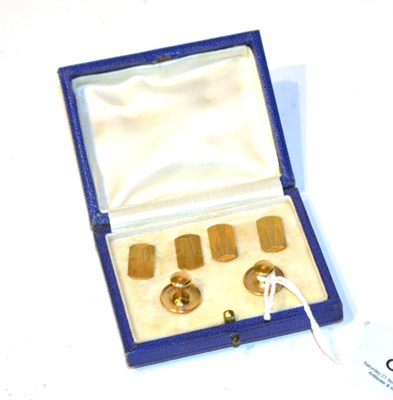 Lot 83 - A cased set of 9 carat gold cufflinks and two dress studs stamped '9CT'