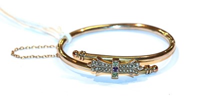 Lot 89 - A peridot, amethyst and split pearl hinged bangle, unmarked, inner measurements 5.6cm by 4.6cm