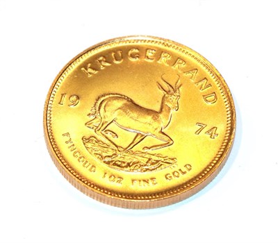 Lot 90 - South Africa, 1974 Krugerrand. 1 oz. fine gold (.999). Obv: Bust of Paul Kruger left. Rev:...