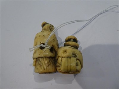Lot 136 - Japanese ivory netsuke, Samurai with a drum, 5.5cm high; another as Jurojin, 5cm high; and...
