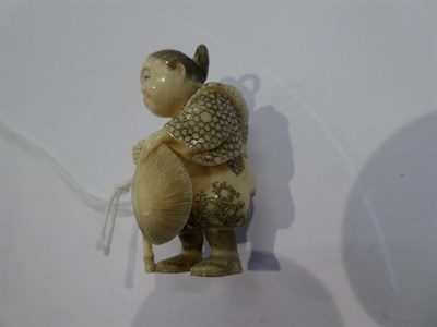 Lot 137 - Japanese ivory netsuke, figure beside a large flask, 3.5cm high, and a man with a straw hat,...