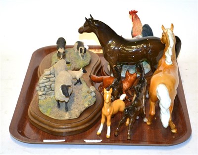 Lot 141 - Beswick horses and foals including a Prancing Arab, palomino gloss together with a Beswick fox, and