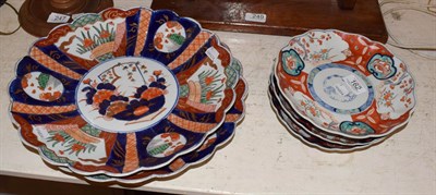 Lot 162 - Two Japanese Imari scalloped chargers with three dishes, largest 34cm diameter  (5)
