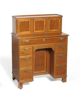 Lot 1439 - An Edwardian Mahogany, Satinwood Banded and Ebony Strung Kneehole Desk stamped Edwards and Roberts