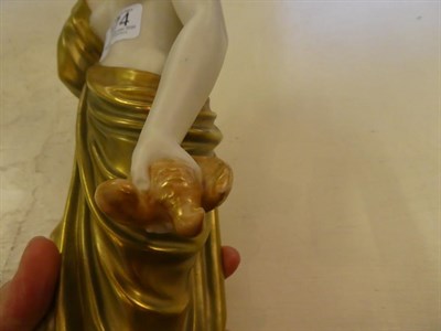 Lot 174 - A Royal Worcester figure of a Classical maiden, puce backstamp 2/57, 41cm high