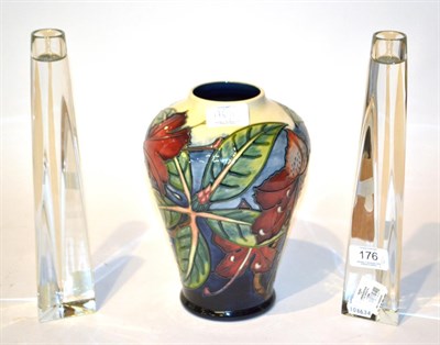 Lot 176 - A Moorcroft vase, 21.5cm high; and a pair of Jasper Conran Waterford crystal candlesticks,...