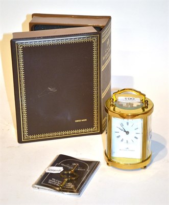 Lot 190 - A Matthew Norman carriage timepiece of oval form, with box, booklet and key