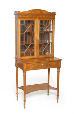 Lot 1441 - An Edwardian Satinwood and Painted Display Cabinet on Stand, circa 1900, richly painted with flower