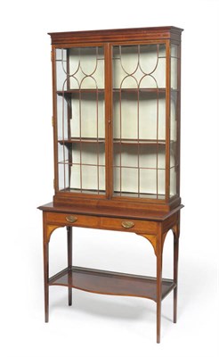 Lot 1442 - An Edwardian Sheraton Revival Inlaid Mahogany Display Cabinet, circa 1900, the cavetto cornice...