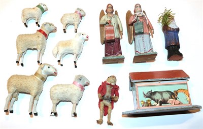Lot 206 - A miniature wooden Noah's ark with papered decoration and five carved animals, six sheep...