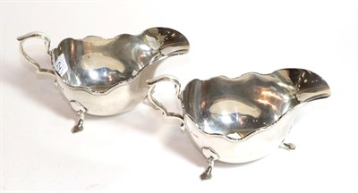 Lot 222 - A pair of Elizabeth II silver sauceboats, by James R. Ogden and Sons Ltd., Sheffield, 1959,...