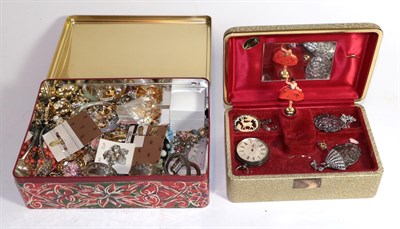 Lot 233 - Two boxes of jewellery, silver, Scottish bangle, Cherub buckle, etc