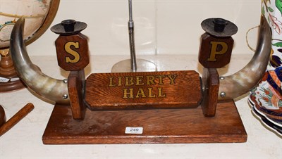 Lot 249 - A Masonic lodge candle stand with horn mount, with title plaque Liberty Hall, 62cm by 26cm high