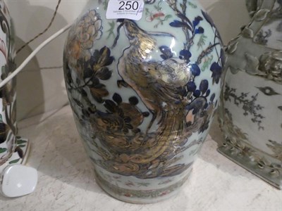 Lot 250 - Two Chinese celadon ground table lamps, 43cm high, converted from vases, together with a Royal...