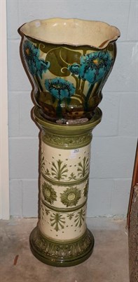 Lot 253 - A Burmantofts jardiniere, 41cm by 33cm high, on an associated Leeds Art Pottery stand, 68cm...