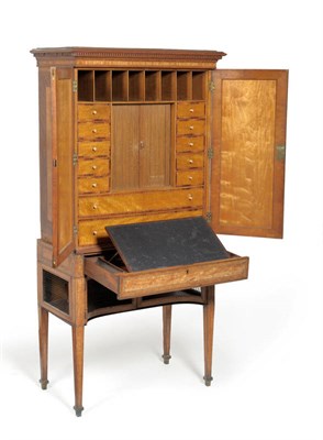 Lot 1447 - A Rare George III Satinwood, Tulipwood and Purpleheart Crossbanded Cabinet on Stand, circa...