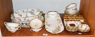 Lot 258 - Twelve Coalport coffee cans and saucers, together with seven Minton's twin-handled cups and...