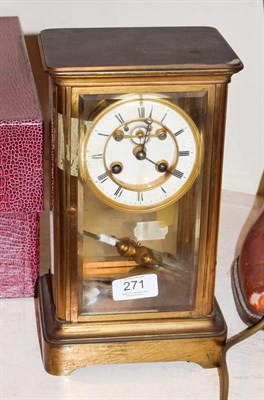 Lot 271 - A brass four glass striking mantel clock, movement stamped S Marti, striking on a bell, with a twin