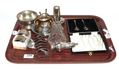 Lot 294 - A collection of assorted silver and silver plate to include pepperette, toast rack, sugar bowl,...