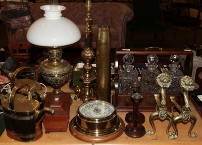 Lot 306 - A brass oil lamp, two brass watering cans, a 19th century tea-caddy, a brass wall barometer, a pair