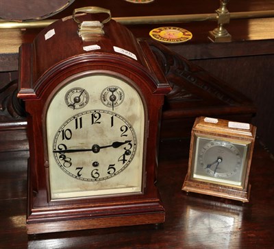 Lot 328 - An early 20th century mahogany bracket clock, triple chain movement, 37cm high; together with...