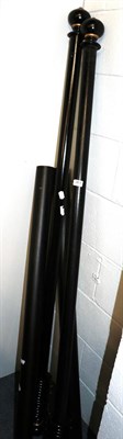 Lot 364 - Pair of ebonised curtain poles and two others, largest 188cm long