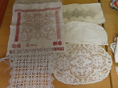 Lot 373 - A good collection of lace, crochet, embroidered table linens and textiles, etc (one bag)