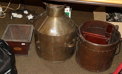 Lot 384 - A copper coal scuttle, 34cm high, an Edwardian planter, a milk churn and a mahogany wall shelf (4)