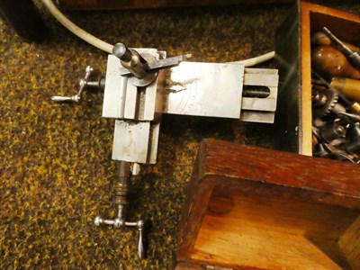 Lot 392 - A German Wolf John & Co watchmakers lathe, with lathe assortments including three jaw chuck,...