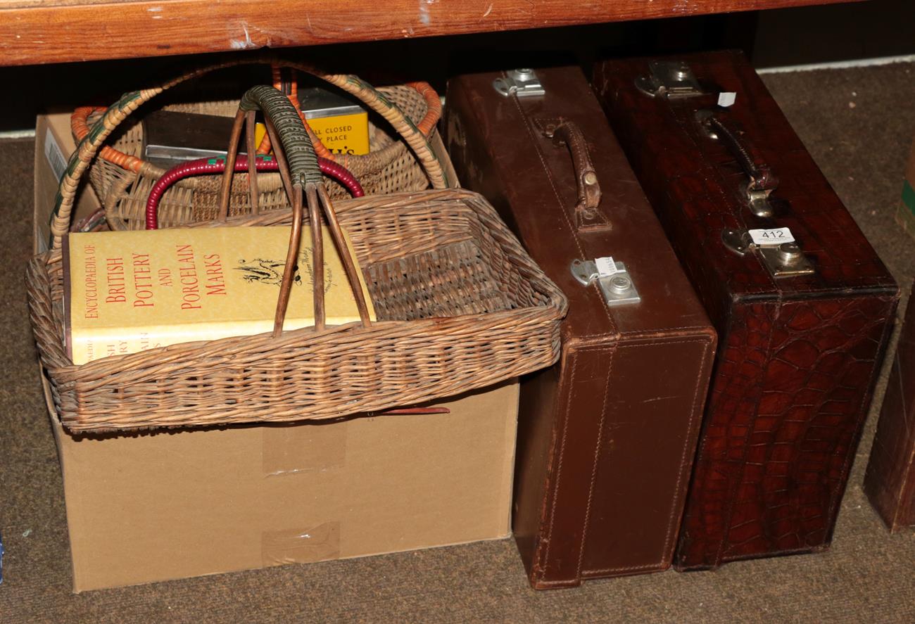 Lot 412 - Leather crocodile case and four wicker baskets circa 1940s, etc