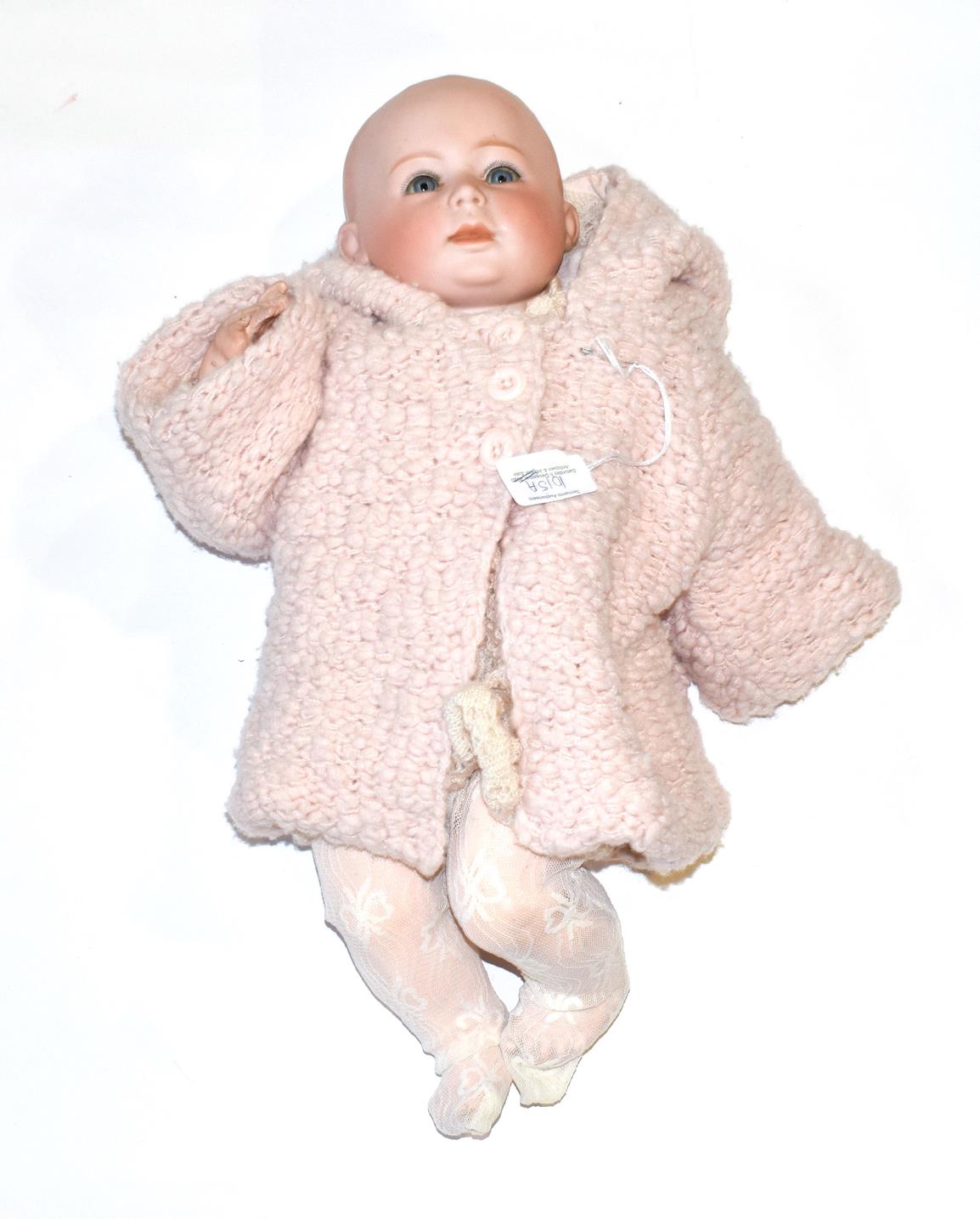 Lot 1015 - German Swaine & Co Lori bisque socket head doll, with impressed and printed mark to the back of the