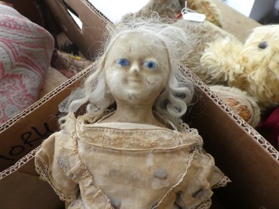 Lot 1027 - Wax head doll (a.f.), another smaller with blue eyes and a bisque head doll